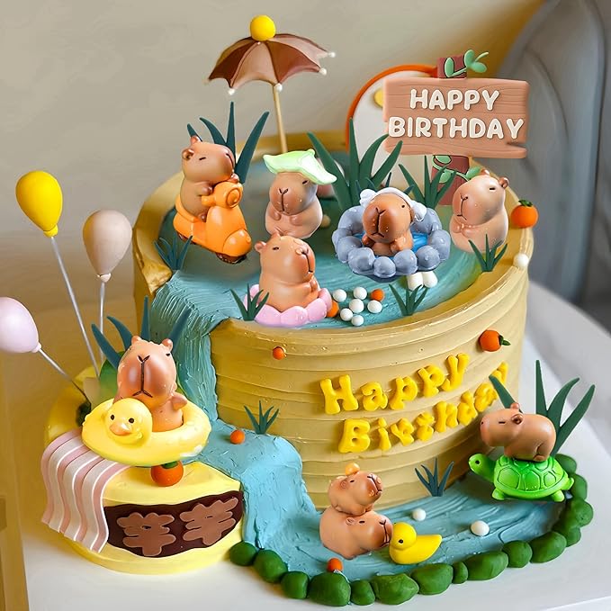Colorful birthday cake with detailed capybara cake toppers playing in water and holding balloons