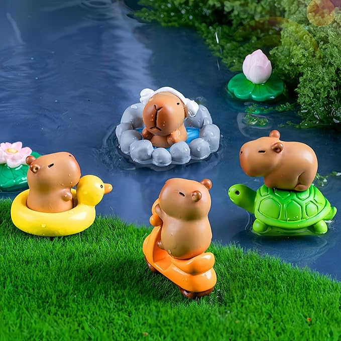 MrsCapybara capybara cake toppers featuring cute capybaras on floaties and a turtle in a pond scene