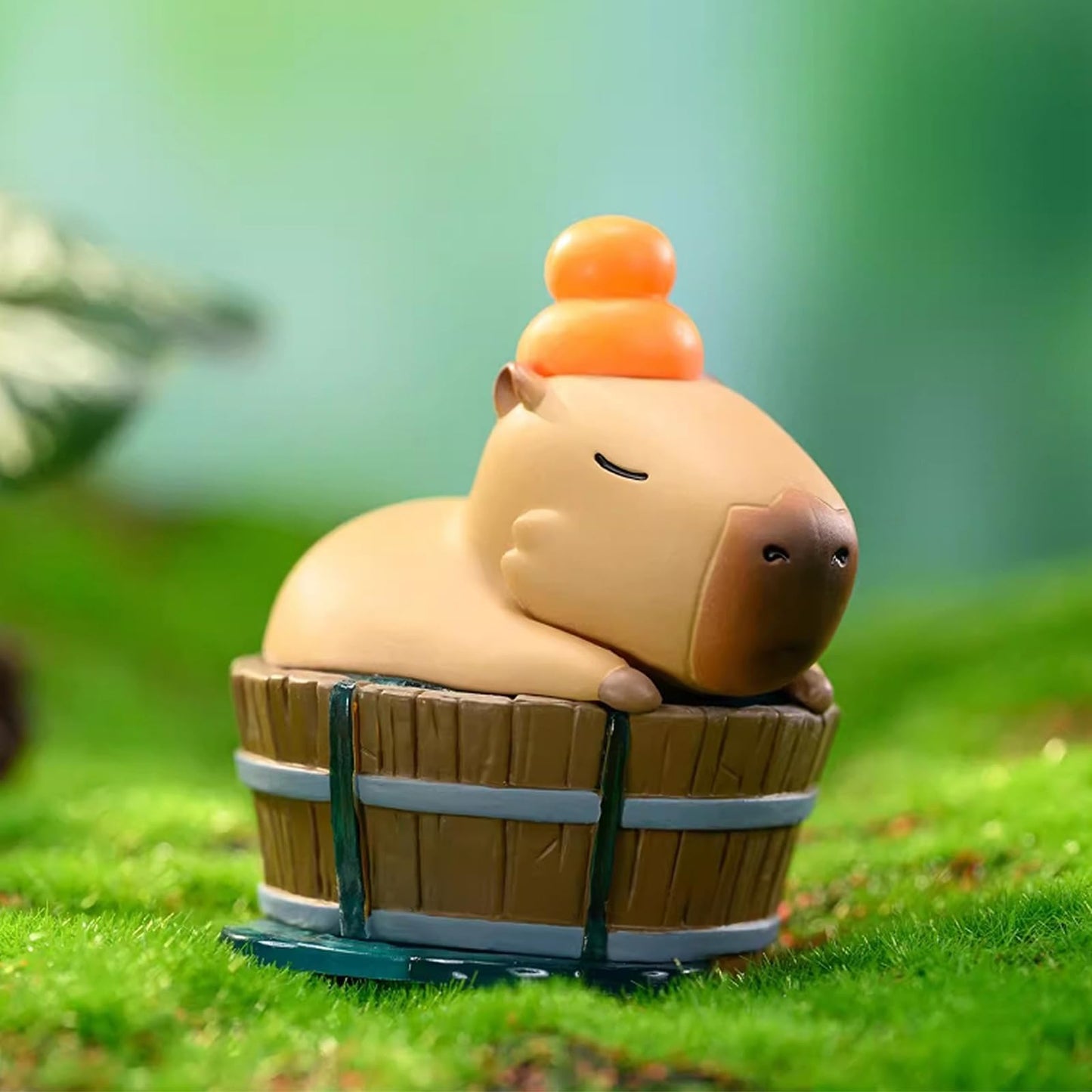 Capybara Cute Cake Toppers featuring a relaxed capybara in a wooden tub with orange bath accessories