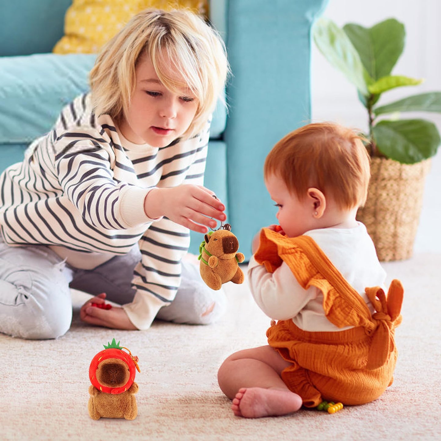 Children playing with a capybara keychain set plush toys indoors on carpet