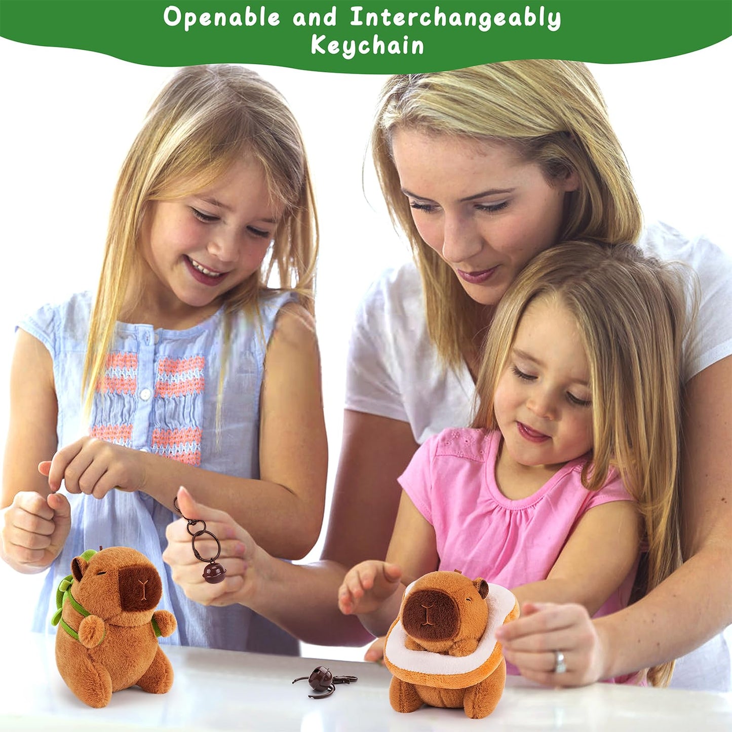 Mother and two daughters playing with an openable and interchangeable capybara keychain set