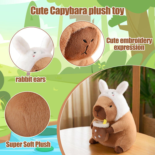 capybara plush toy wearing a white bunny hat holding a cup with a straw next to a smiling toddler