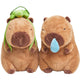 capybara plush toy set featuring two cute brown capybaras, one with a green turtle hat and the other with a blue teardrop accessory