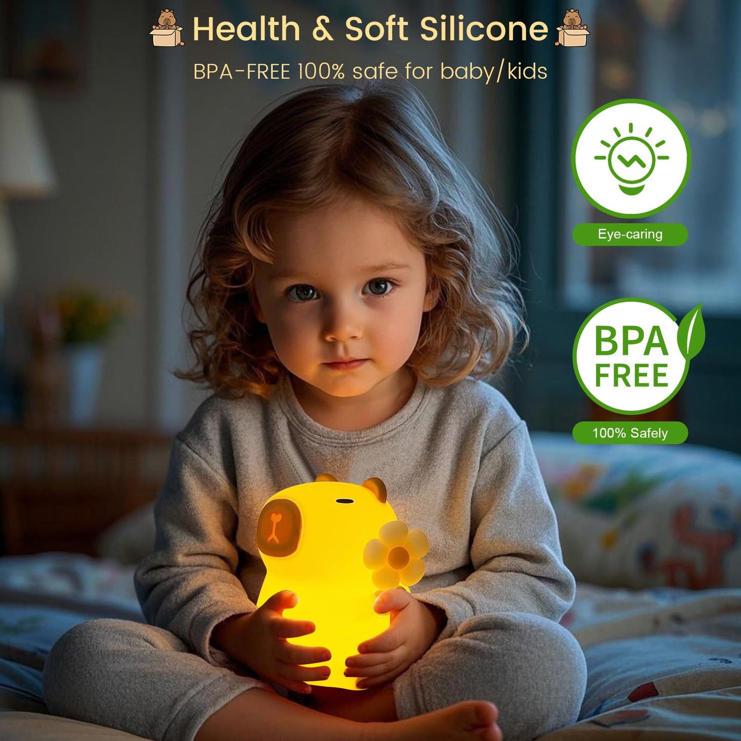 Child holding a glowing cute animal nursery lamp made of soft silicone, safe and BPA free