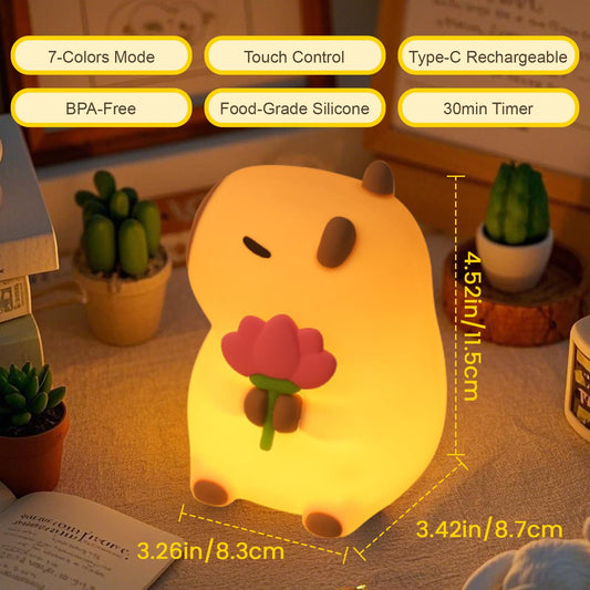 Cute animal nursery lamp shaped like a beige bear holding a white daisy flower
