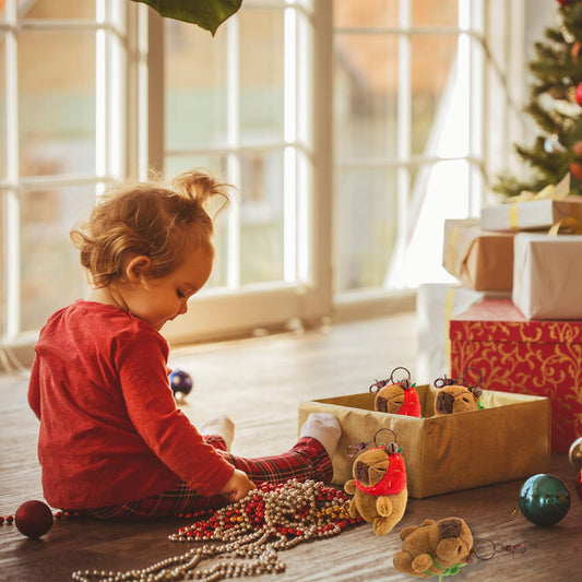 plush capybara keychain 4 pack with soft brown capybara toys wearing colorful scarves and clips
