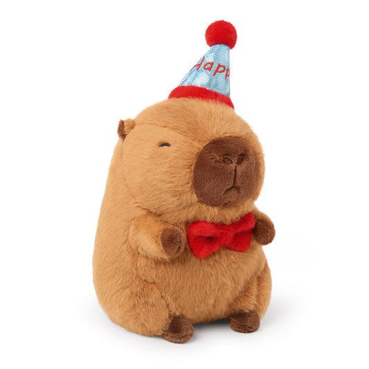 capybara birthday plush pillow wearing a blue party hat and red bow tie