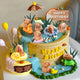 Colorful birthday cake with detailed capybara cake toppers playing in water and holding balloons