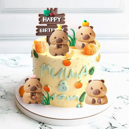 Birthday cake decorated with cute brown capybara cake toppers and colorful decorations on white stand