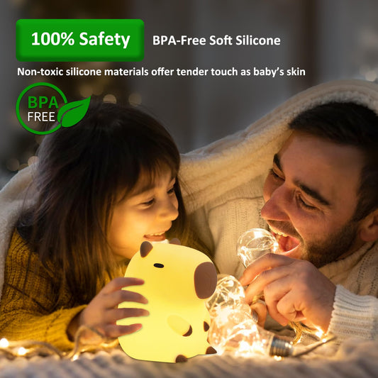 capybara night light glowing warmly on a wooden surface with a cozy background