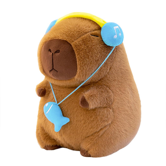 capybara plush with headset featuring blue headphones and fish pendant on brown stuffed animal