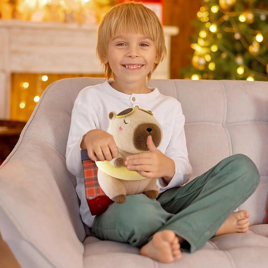 capybara plush with swim ring and small yellow duck wearing sunglasses