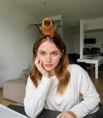 Young woman wearing a cute capybara hair accessory with plush design and feather details indoors