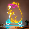 Zidoni capybara themed room decor neon light sign of capybara riding a blue scooter with pink glasses