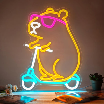 Zidoni capybara themed room decor neon light sign of capybara riding a blue scooter with pink glasses