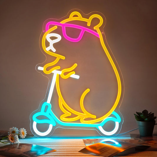 Zidoni capybara themed room decor neon light sign of capybara riding a blue scooter with pink glasses